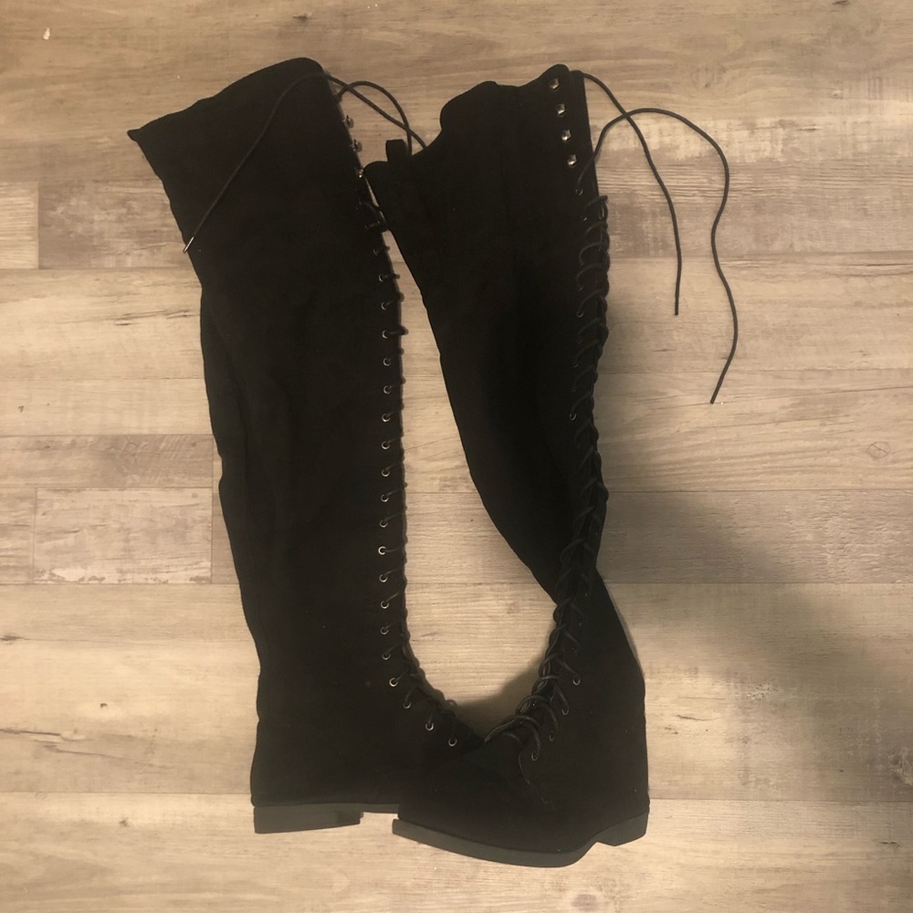 Black laced over the knee boots